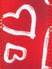 red ribbon with white heart patterns iridescent fabric with stitched edges romantic and playful design