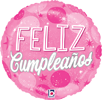 round pink foil balloon with Feliz Cumplea�os text pink and white lettering sparkling star accents and celestial details for Spanish birthday celebration decor