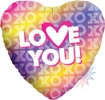 This holographic heart shaped balloon has xoxo all over as a background and Love You in the center