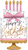 Cake shaped birthday balloon with white frosting pink bow candles on top polka dots and Happy Birthday script design