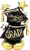 This balloon is in the shape of two grad caps with the words Congrats Grad on each