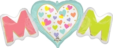Foil balloon with pink and green MOM letters, heart shaped center filled with multicolored hearts, cheerful and festive design